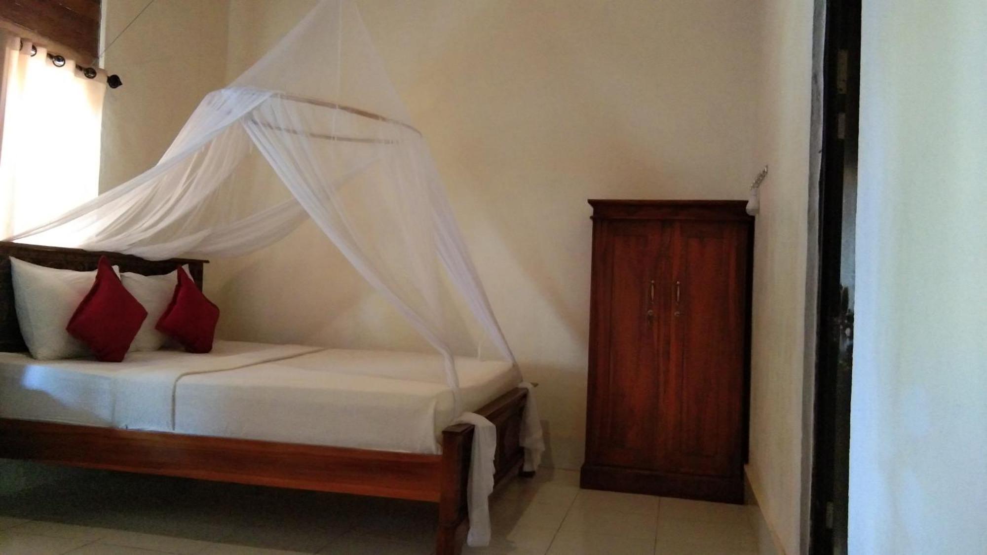 Timbool Bungalow Ped Room photo